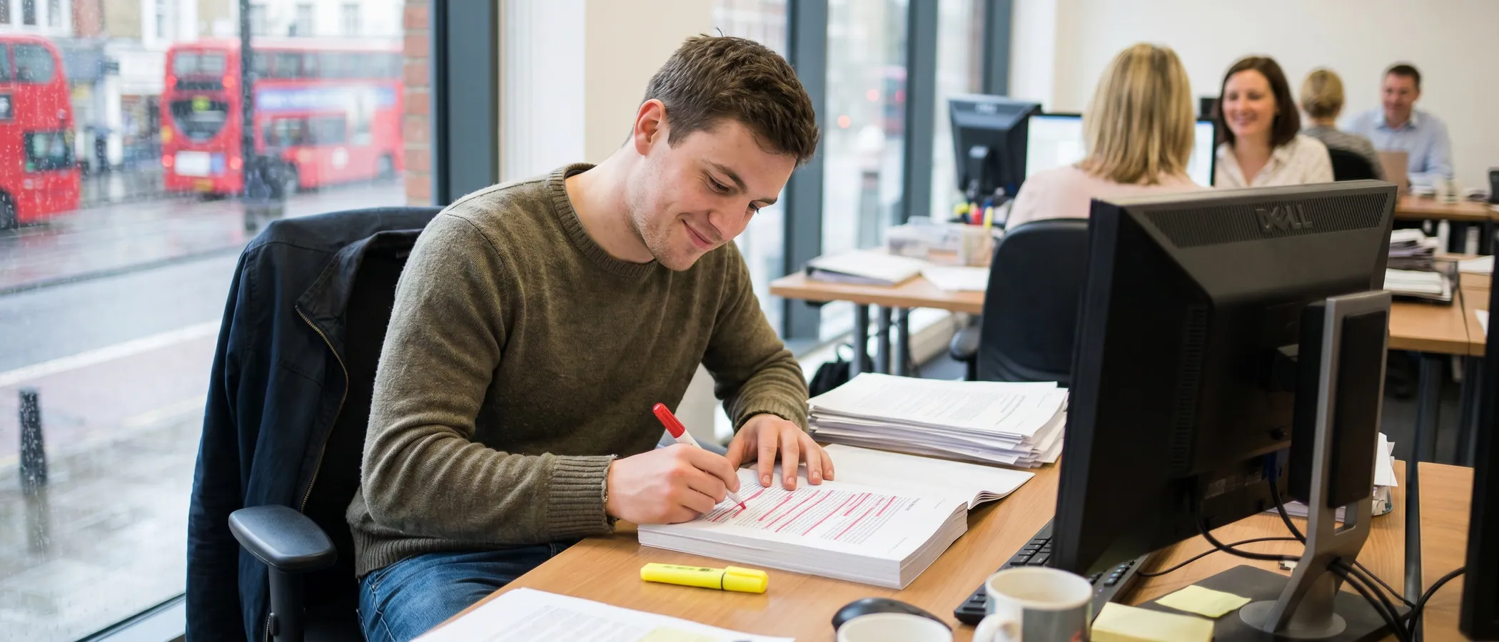 A person reviewing search data on a laptop while refining a negative keywords list